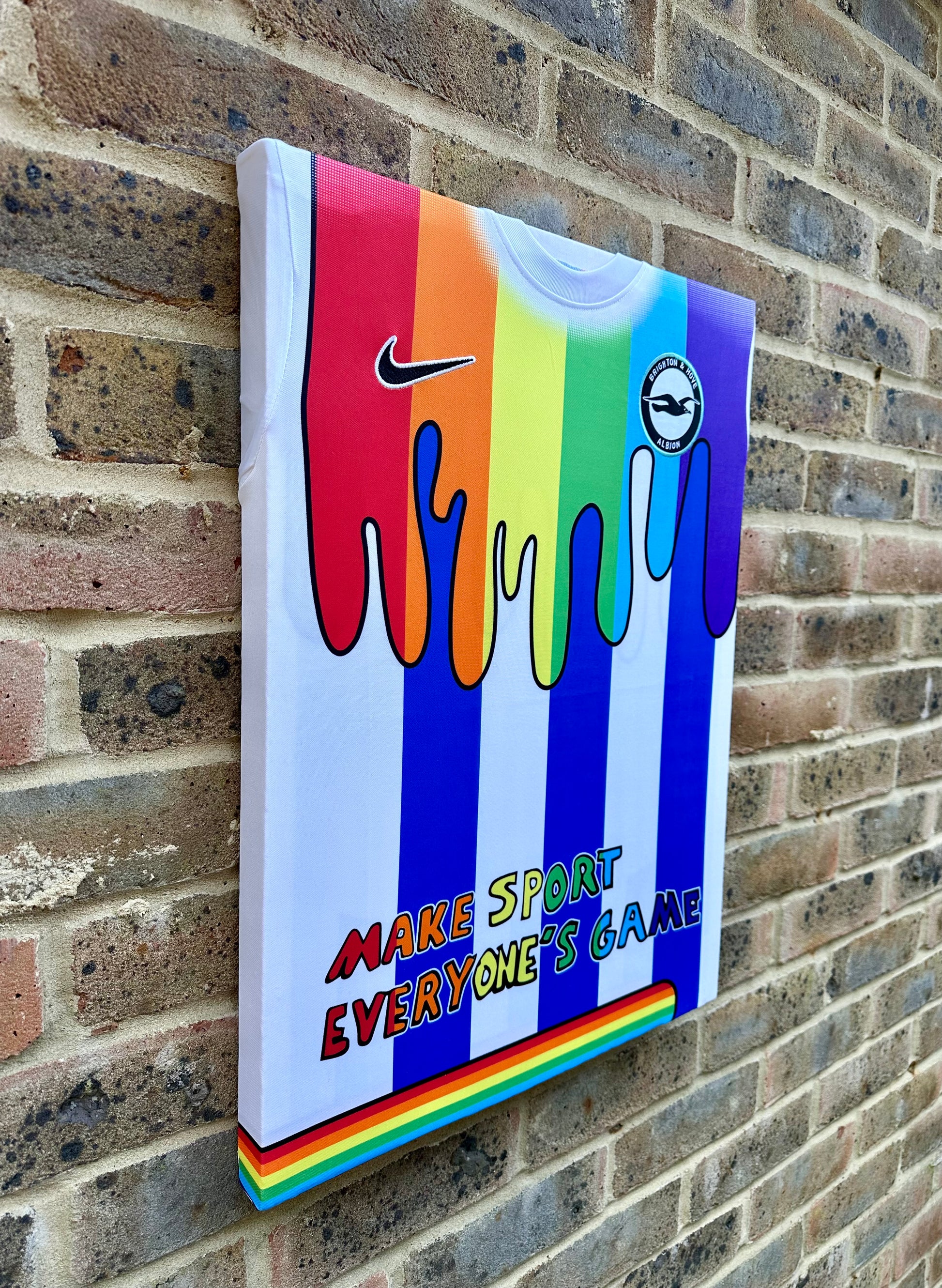 Brighton and hove Albion special pride edition pre match football shirt memorabilia canvas in rainbow colours in support of lgbtq