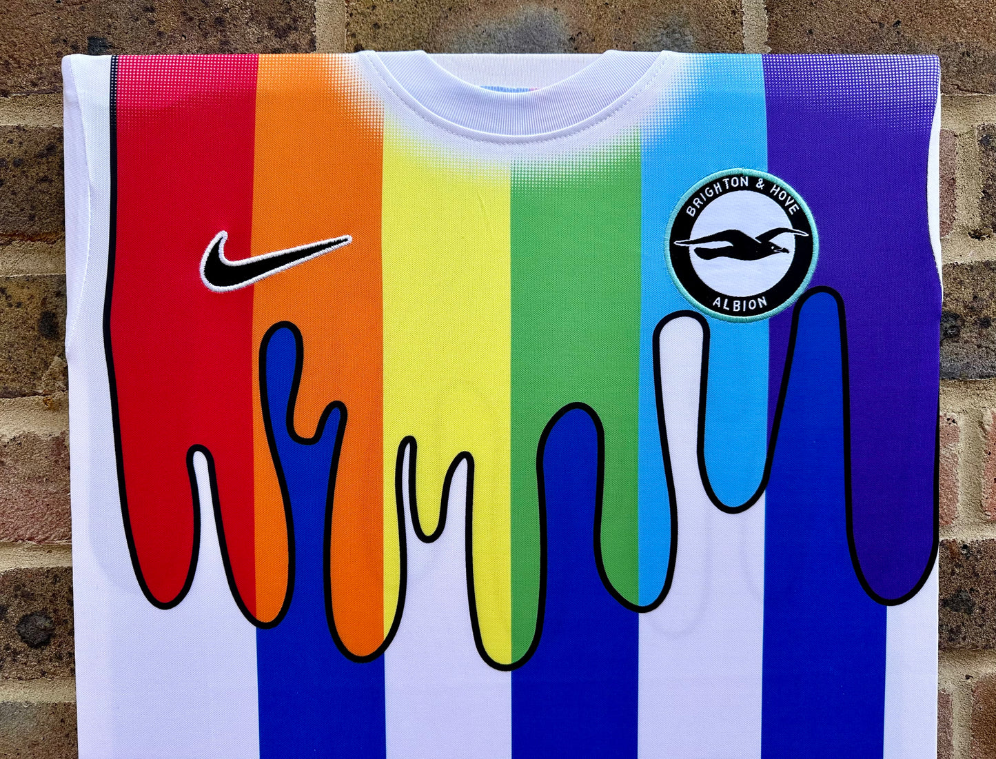 Brighton and hove Albion special pride edition pre match football shirt memorabilia canvas in rainbow colours in support of lgbtq