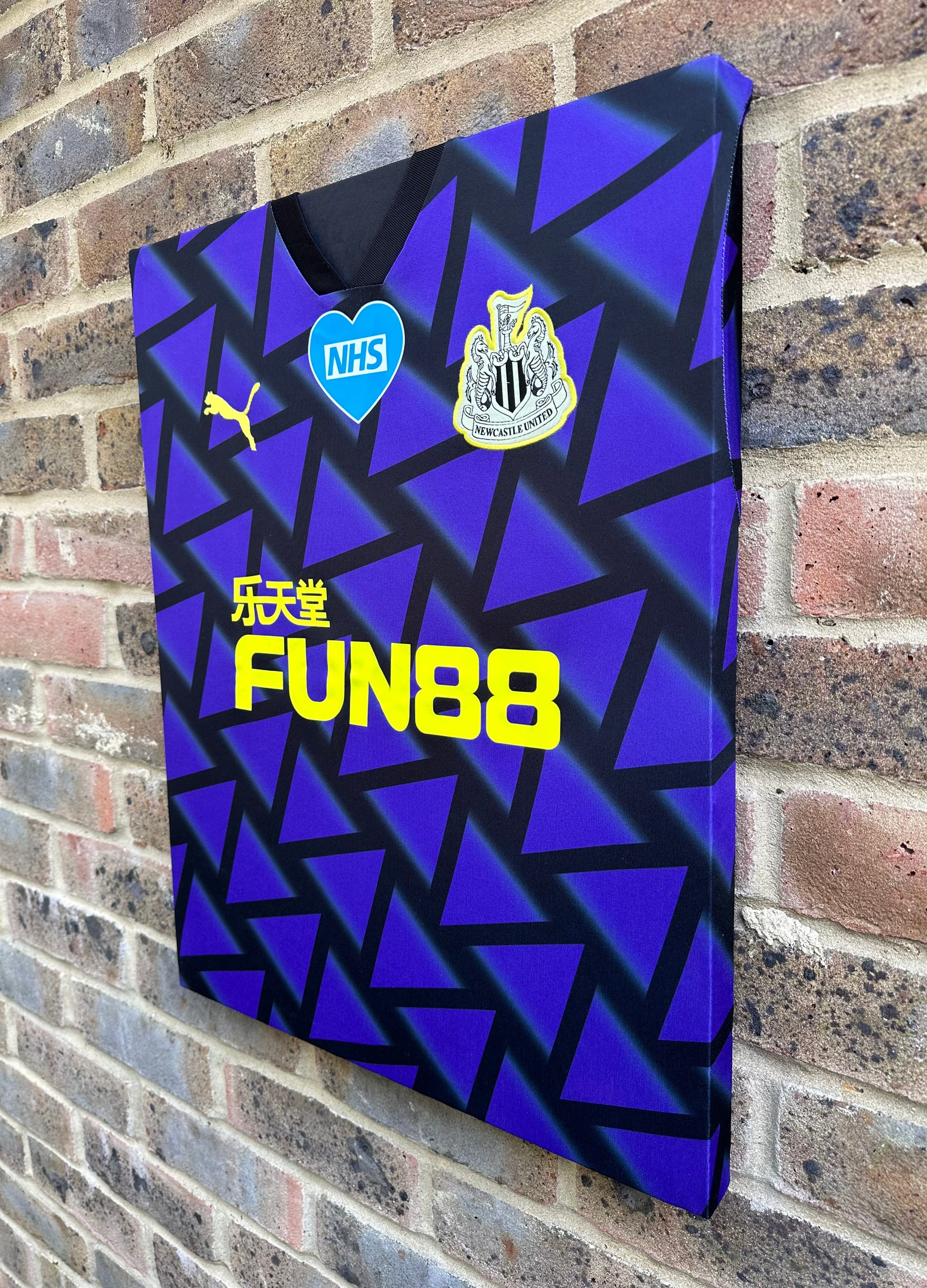 Newcastle United 2020/21 away shirt with NHS patch memorabilia canvas