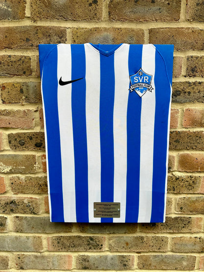 Football shirt made into a canvas memorabilia with a plaque