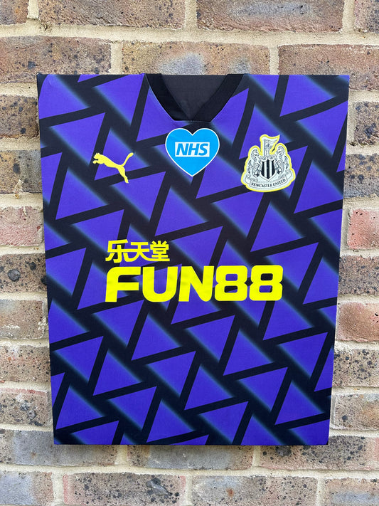 Newcastle United 2020/21 away shirt with NHS patch memorabilia canvas