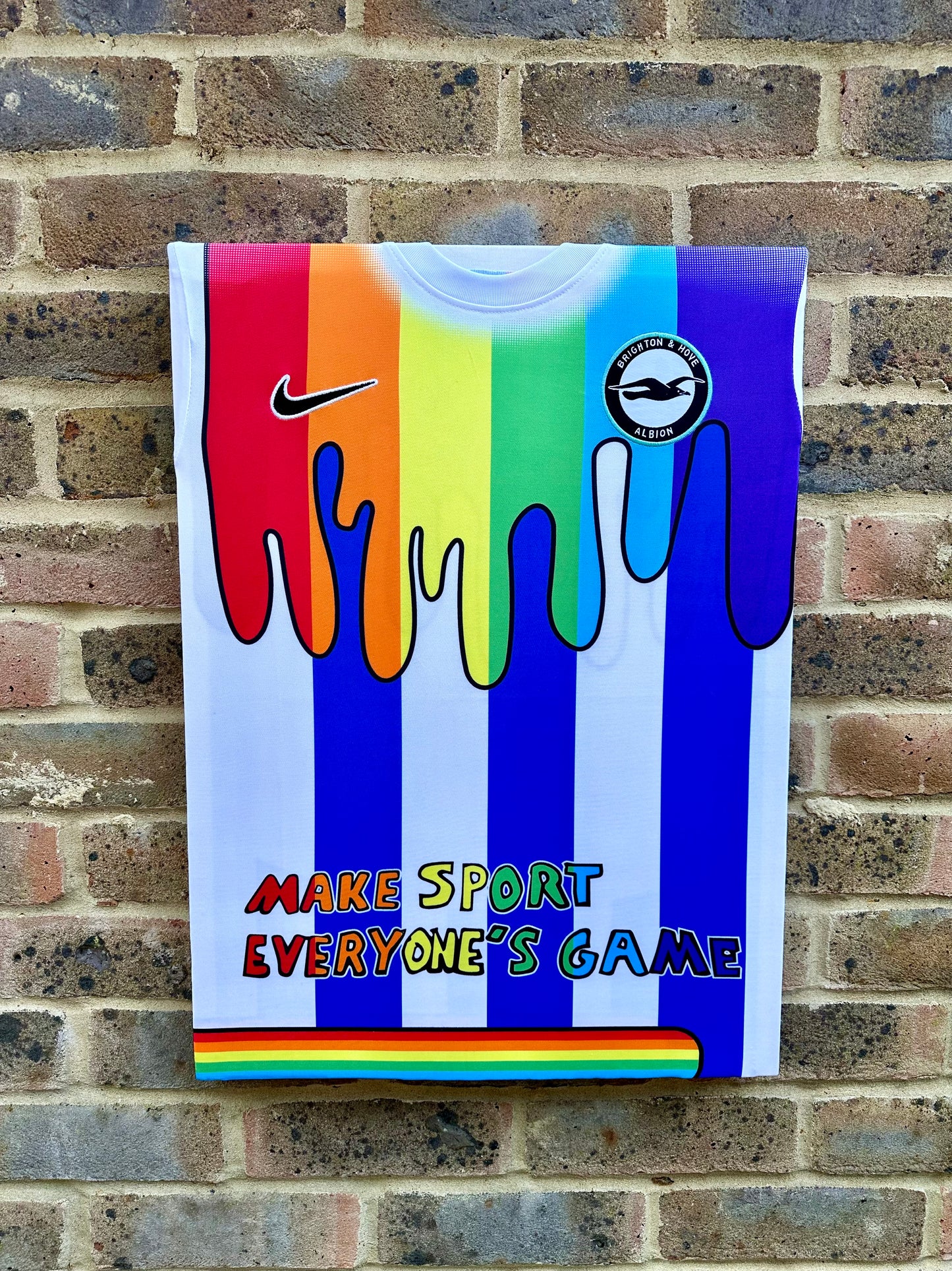 Brighton and hove Albion special pride edition pre match football shirt memorabilia canvas in rainbow colours in support of lgbtq